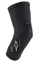 Alpinestars Paragon Lite Knee Protector, rodillera ligera negra con construcción de malla texturizada, logo blanco y líneas de diseño grises, diseño de manga tipo slip-on con etiquetas CE Nivel 1 y Polygiene, diseñado para MTB y ciclismo todoterreno