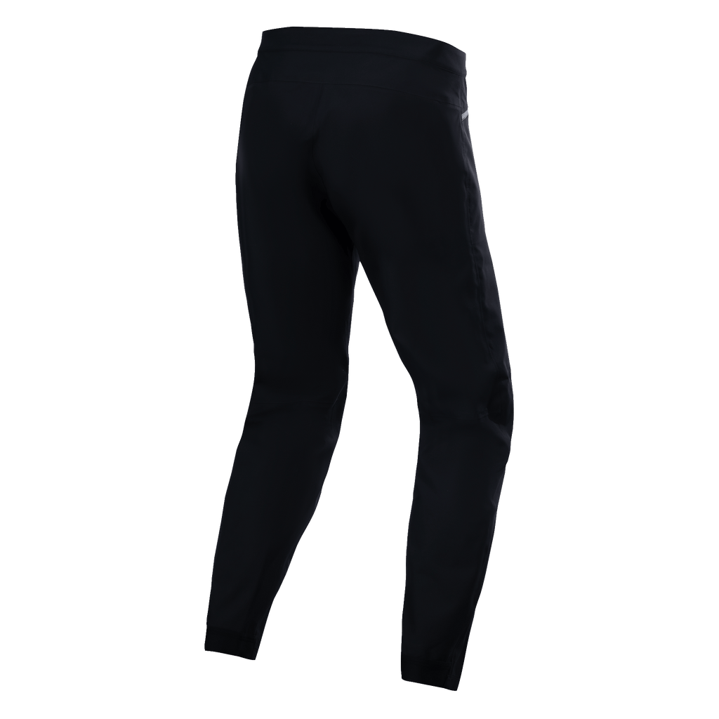 Pantalones impermeables Alpinestars A-Dura, negro, vista trasera que muestra la construcción de tejido técnico, pantalones de mountain bike con clasificación de impermeabilidad de 20k, tejido elástico duradero para rodar en condiciones húmedas