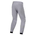 Pantalones impermeables Alpinestars A-Dura, pantalones de MTB, gris titanio, vista trasera, con perneras cónicas y puños elásticos negros, diseño técnico minimalista para ciclismo de montaña