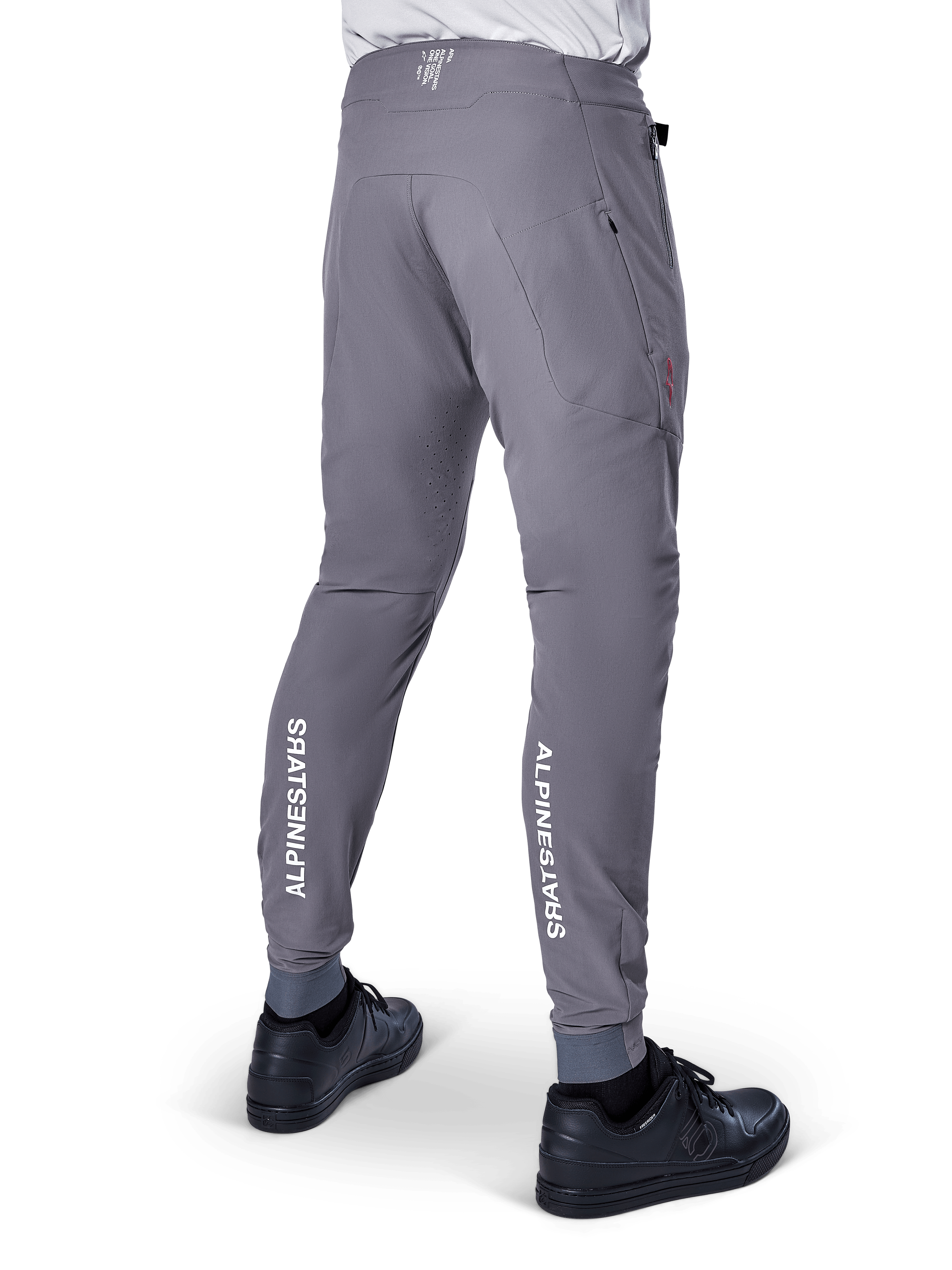Pantalones Alpinestars A-Aria Elite, pantalones de MTB, gris oscuro, con logotipos blancos verticales de Alpinestars en la parte posterior de las piernas, orificios de ventilación cortados con láser, puños elásticos y ajuste de rendimiento para ciclismo de montaña
