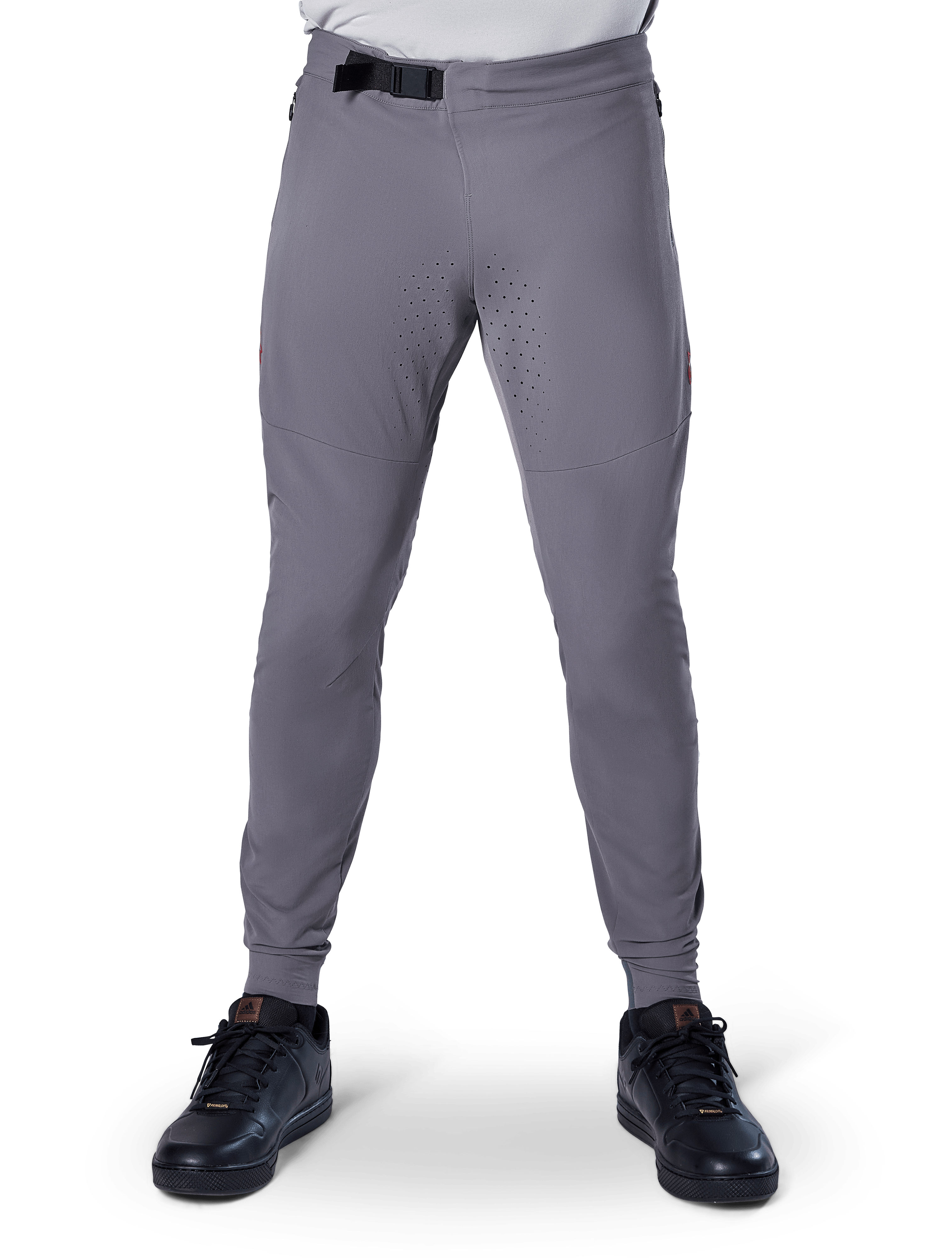 Pantalones Alpinestars A-Aria Elite, pantalones de ciclismo de montaña, gris oscuro, con perforaciones láser en la parte interna de los muslos para ventilación y cierre de hebilla magnética en la cintura, ajuste de rendimiento con perneras entalladas, usados con zapatillas deportivas negras