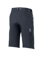 Shorts A-Dura Elite de Alpinestars, pantalones cortos para bicicleta de montaña, negro, vista trasera de tres cuartos con bolsillo lateral con cremallera, logotipo blanco de Astars y marca "DURA" en la cintura, resistente tejido Cordura elástico en 4 direcciones para ciclismo de montaña