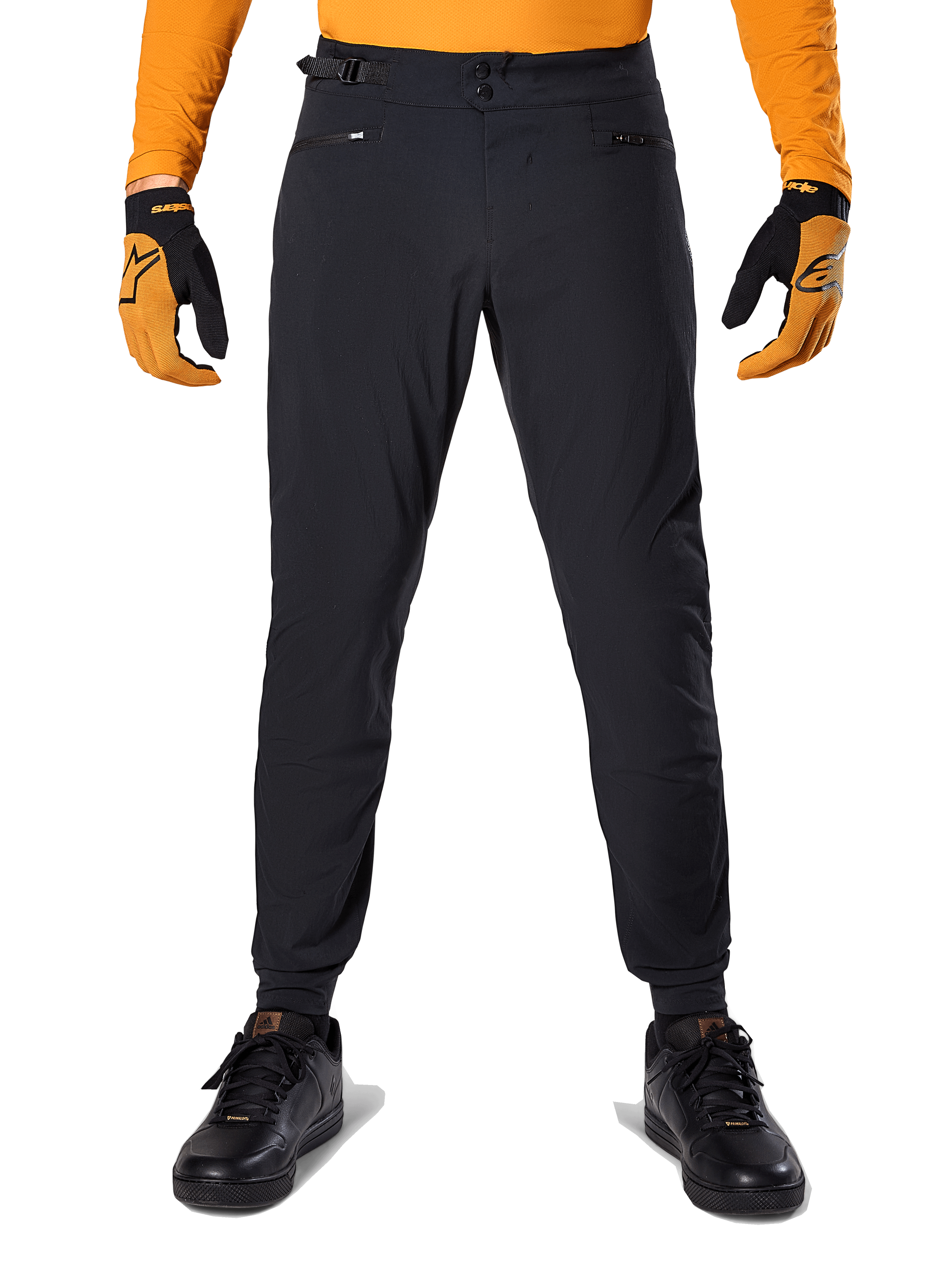 Pantalones Alpinestars A-Dura, pantalones de ciclismo de montaña, negros, combinados con un jersey naranja de manga larga y guantes negros y naranjas, con cierre de doble broche y ajustadores laterales de cintura, tejido duradero para ciclismo de montaña