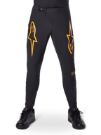 Alpinestars A-Supra Race Pants, pantalones de ciclismo MTB, negros con logotipos naranjas llamativos, con cierre de cintura de trinquete y ventilación perforada con láser, ajuste de rendimiento diseñado para carreras de bicicleta de montaña todoterreno