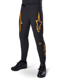 Alpinestars A-Supra Race Pants, negros con gráficos de estrellas naranjas, pantalones de carreras de MTB con ventilación perforada por láser y cierre de cintura con trinquete, ajuste de rendimiento para ciclismo de montaña