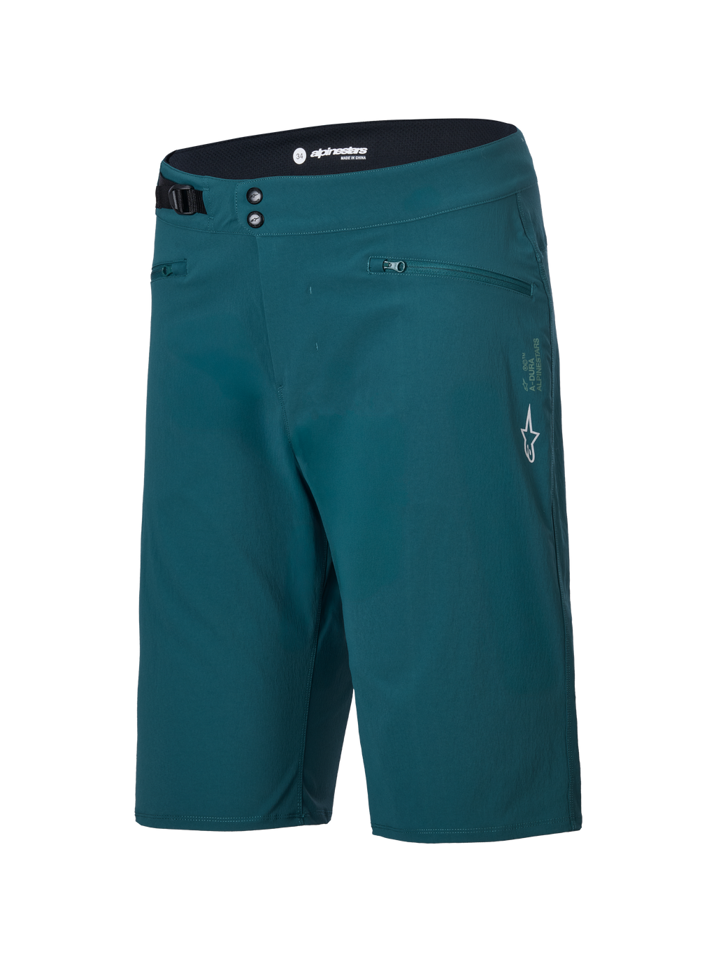 Shorts Alpinestars A-Dura, shorts de ciclismo de montaña, color verde pino oscuro, con bolsillos con cremallera, cierre frontal de doble broche, ajuste lateral de cintura regulable y logo blanco de Alpinestars en la pierna izquierda, diseño duradero para ciclismo MTB