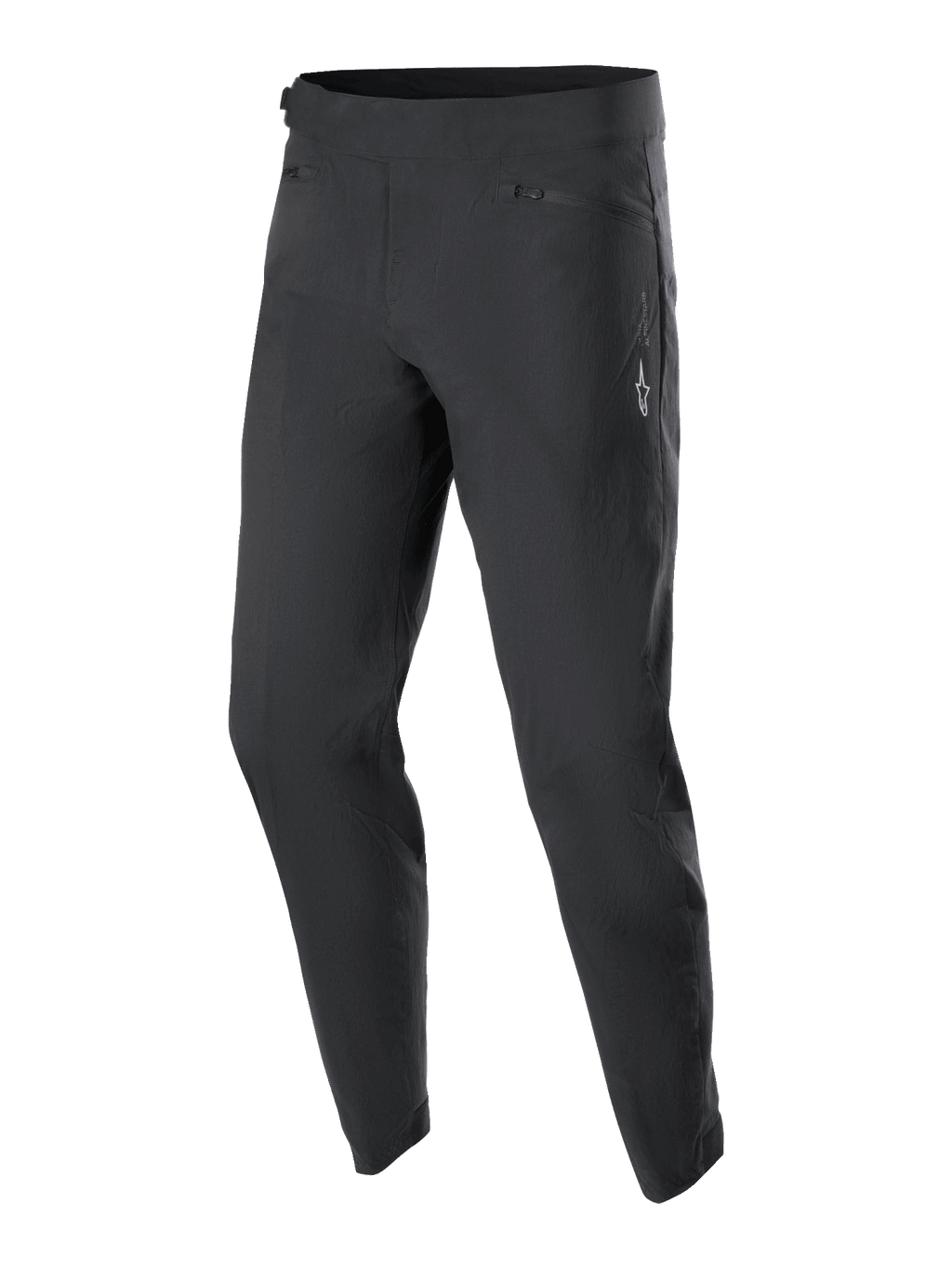 Alpinestars Youth A-Dura Pants, pantalones de ciclismo MTB para jóvenes, negros, con dos bolsillos delanteros con cremallera y un pequeño logotipo blanco de Alpinestars en el muslo izquierdo, diseño de pierna cónica y tejido elástico duradero para ciclismo de montaña.