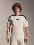 Alpinestars A-Aria Polartec Elite Jersey, camiseta de ciclismo de montaña de manga corta, color crudo con paneles negros en los hombros, logotipo astars negro en el pecho, prenda de MTB de ajuste de alto rendimiento
