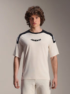 Alpinestars A-Aria Polartec Elite Jersey, camiseta de ciclismo de montaña de manga corta, color crudo con paneles negros en los hombros, logotipo astars negro en el pecho, prenda de MTB de ajuste de alto rendimiento