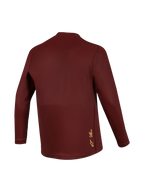 Camiseta A-Dura Ride de manga larga burdeos, tejido jacquard de rendimiento y logotipo amarillo en la parte trasera.