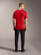 Red A-Dura Ride Short Sleeve Jersey, back view, featuring a dropped tail and lightweight performance fabric for MTB.