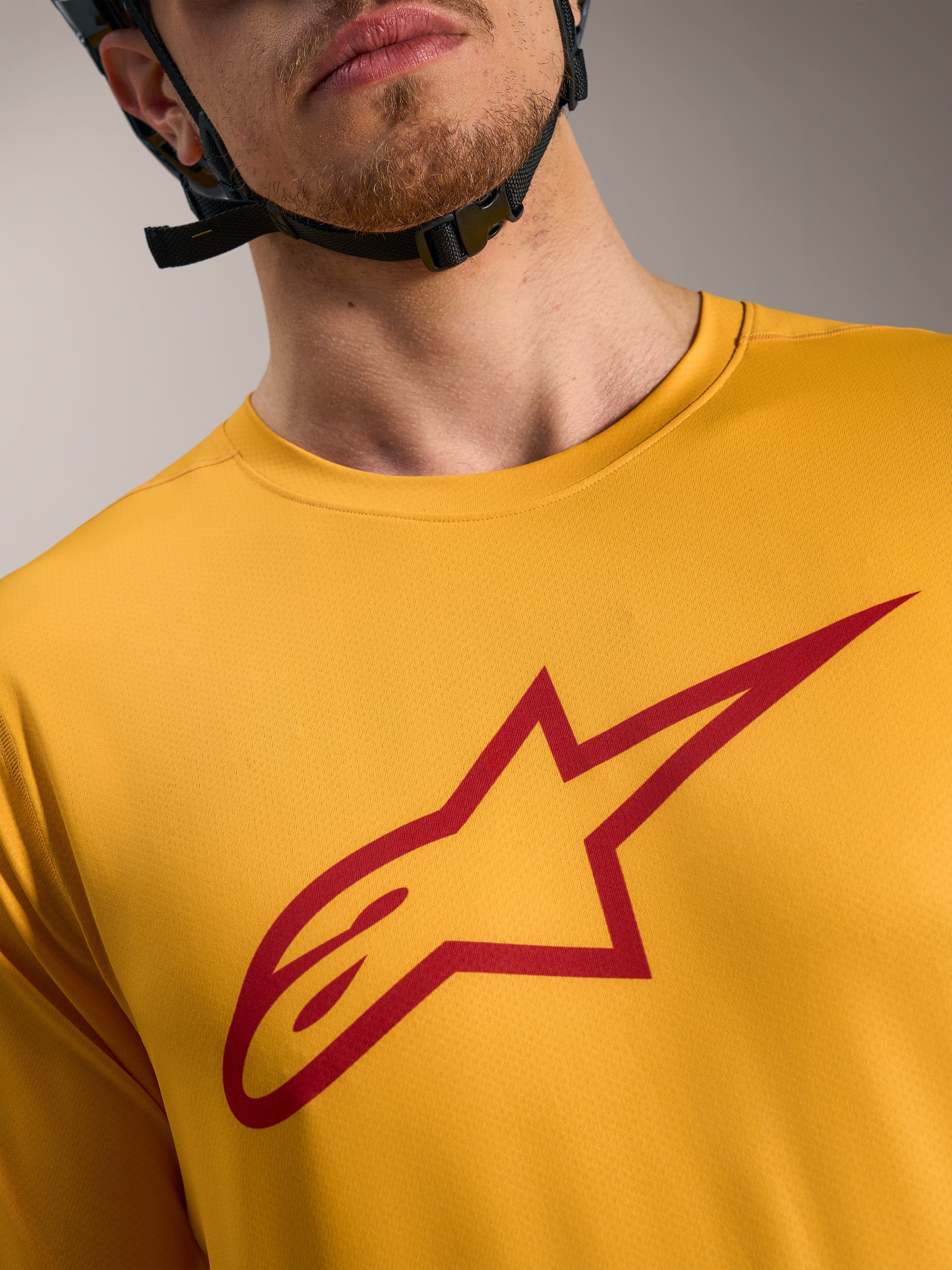 Jersey Alpinestars A-Dura Ride naranja con logo Astars rojo, prenda técnica de manga corta para ciclismo de montaña MTB