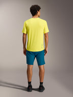 Jersey A-Dura Ride SS amarillo y shorts A-Dura Ride azul verdoso, vista trasera de ropa técnica para MTB.