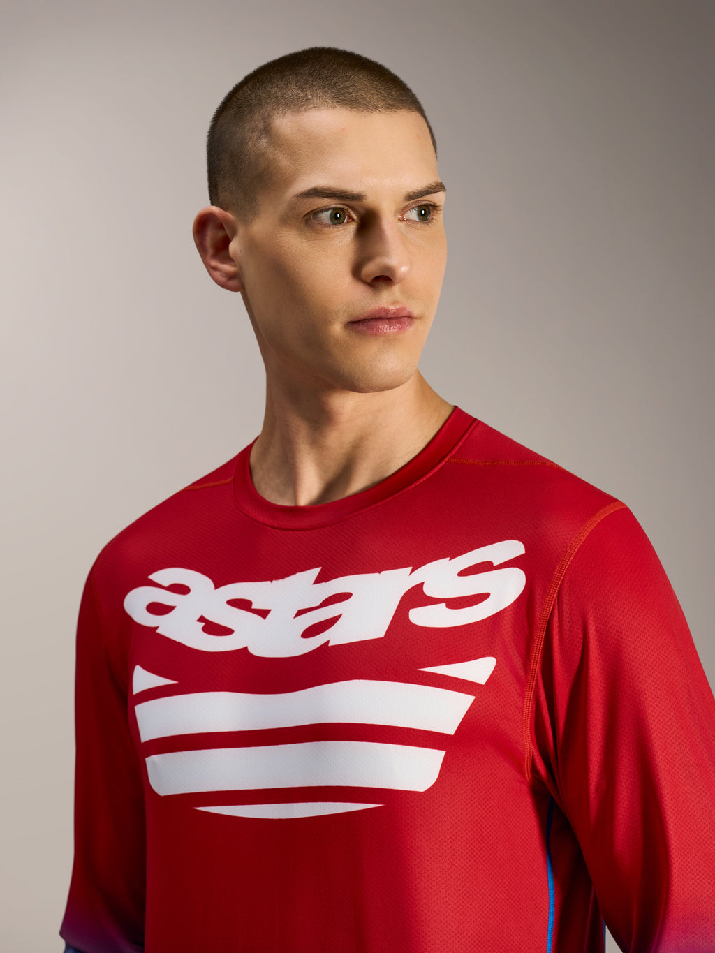 Camiseta A-Dura ASTARS 2.0, jersey de MTB de manga larga rojo y azul con gráficos blancos del logo en el pecho.