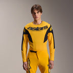 Alpinestars Limited Edition A-Supra Melt Gold Gear-Set, yellow MTB long sleeve jersey and matching pants, black astars branding on chest, athletic performance fit for mountain biking