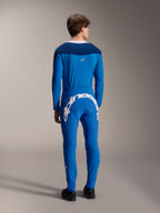 Pantalones Alpinestars A-Supra Melt y jersey de manga larga a juego, azul, vista trasera que resalta la gran marca denominativa Alpinestars en blanco en el canesú trasero, equipo de MTB de alto rendimiento con un ajuste atlético flexible