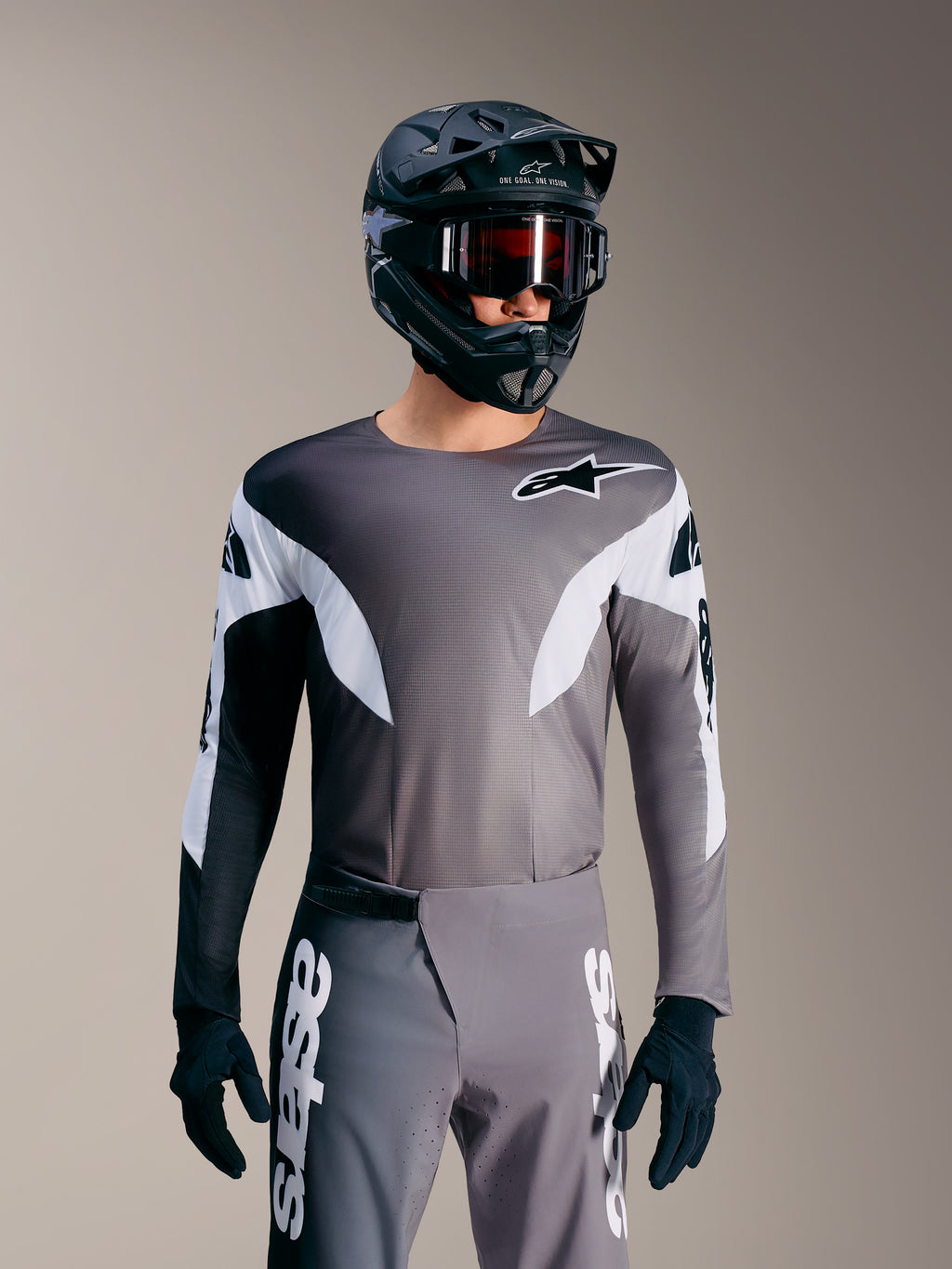 Jersey Alpinestars A-Supra Elite gris degradado, maillot de MTB microperforado con detalles blancos y estilo racing.