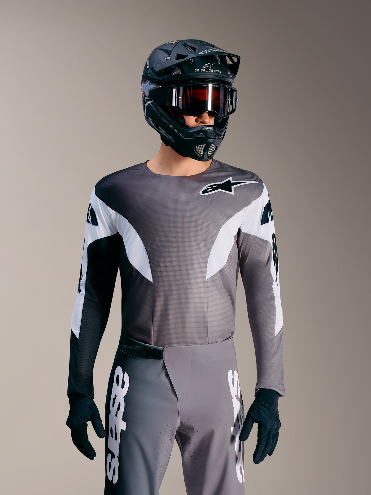 Jersey Alpinestars A-Supra Elite gris degradado, maillot de MTB microperforado con detalles blancos y estilo racing.