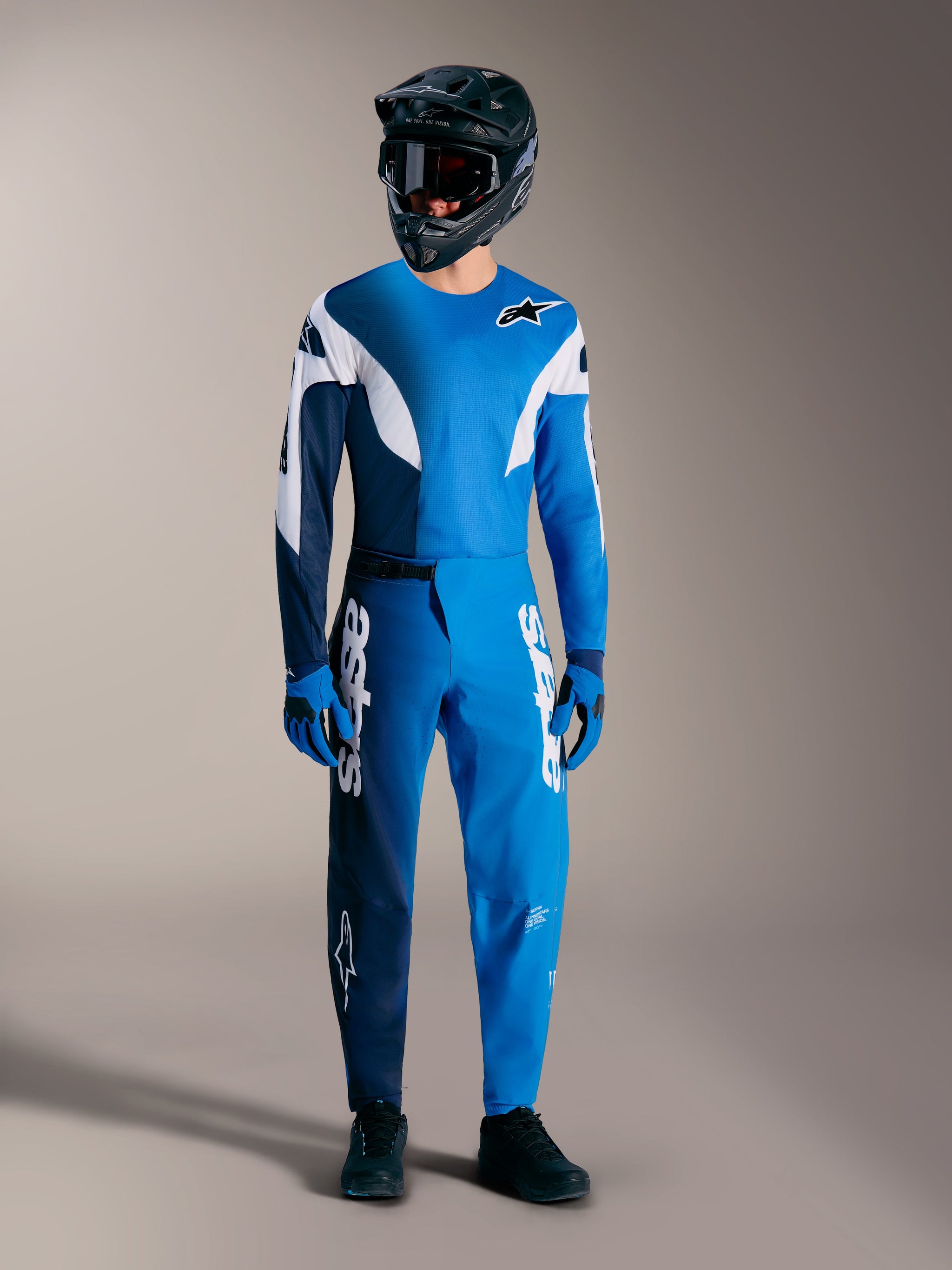 2026 Alpinestars A-Supra Elite kit in faded bright blue, featuring a technical jersey and racing pants for performance MTB.