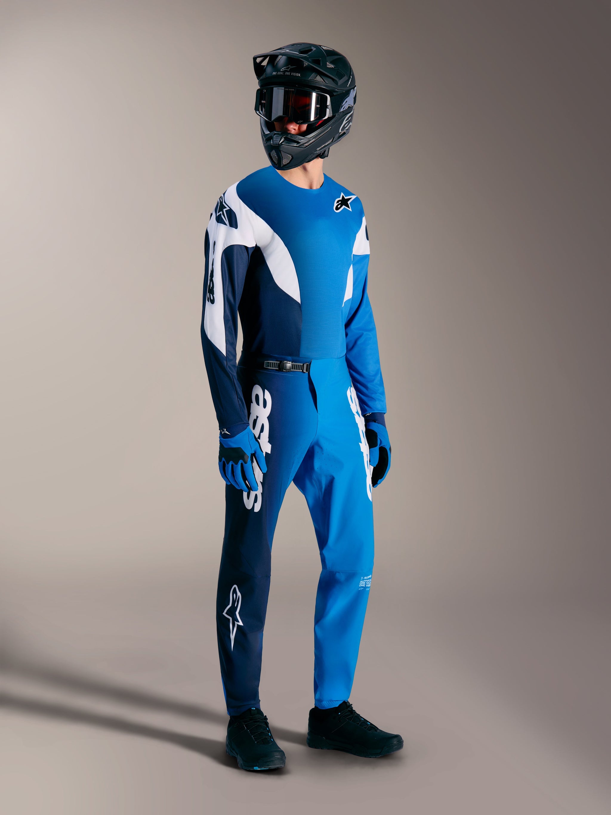 Alpinestars A-Supra Elite MTB kit in Faded Bright Blue, featuring performance pants and jersey with bold white logos.