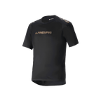 Alpinestars A-Aria Polartec Switch Short Sleeve Jersey, jersey de montaña negro, logos Alpinestars en tonos bronce en el pecho y los hombros, tejido técnico que absorbe la humedad, ajuste de rendimiento con dobladillo trasero más largo