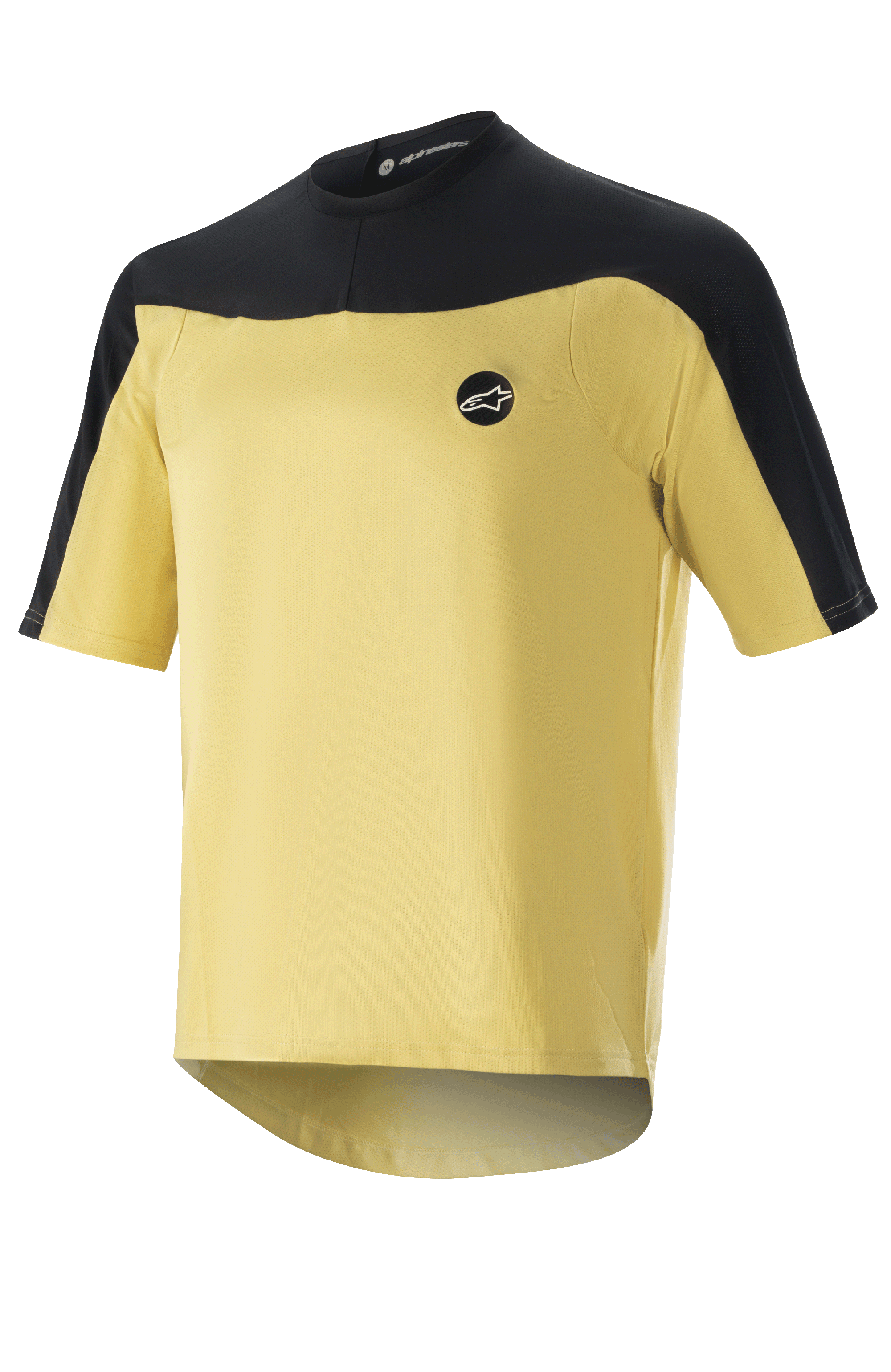 Alpinestars Drop Meta Jersey de manga corta, camiseta de ciclismo MTB, dorada y negra, construcción de malla con hombros en bloques de color, logo circular en el pecho y dobladillo trasero extendido.