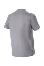 Alpinestars A-Dura Astar Short Sleeve Jersey, gris oscuro, vista posterior de jersey de bicicleta de montaña, con una parte trasera más larga y marca lateral sutil, textura jacquard para rendimiento en ciclismo