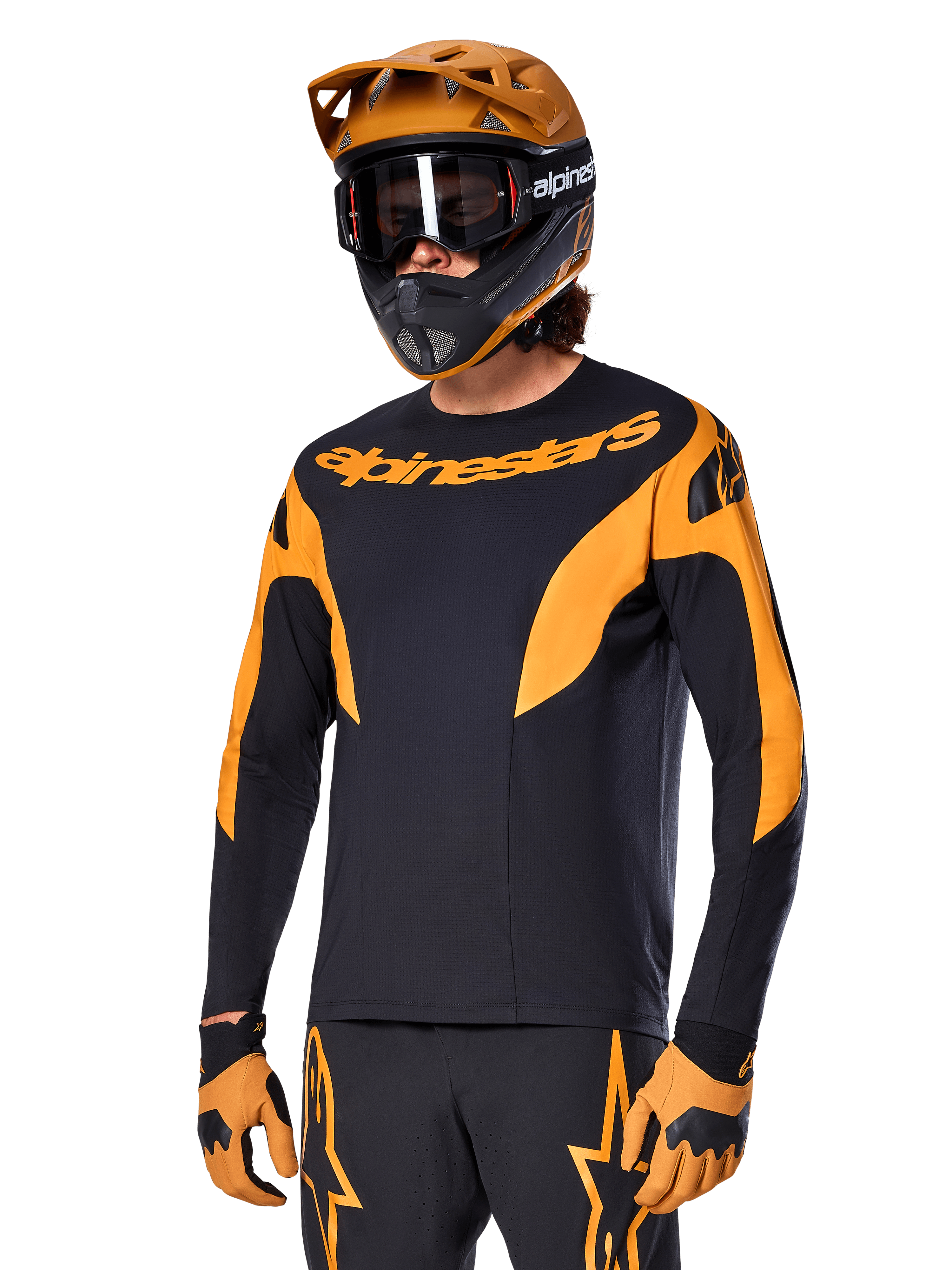 Alpinestars A-Supra Race Jersey - Long Sleeve, MTB Cycling Jersey, Black and Orange, worn with matching helmet and gloves, featuring Alpinestars branding on chest and stylized accents on sleeves, performance fit for off-road racing