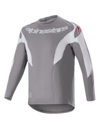 Alpinestars A-Supra Race Jersey, jersey de MTB de manga larga, gris oscuro con paneles blancos, con el logotipo de Alpinestars blanco en el pecho y logotipos de estrellas rojas en los hombros, tejido técnico microperforado con diseño de cola caída para ciclismo de montaña