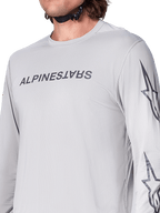 Alpinestars A-Dura Switch Jersey de manga larga, jersey de ciclismo de montaña gris claro con logotipo en el pecho y logo de estrella en la manga, textura jacquard transpirable, equipamiento de alto rendimiento para trail