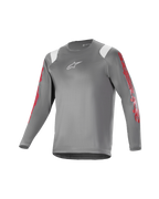 Alpinestars Youth A Supra Astar Jersey, camiseta juvenil de manga larga, gris oscuro con detalles blancos en los hombros y logotipos rojos en las mangas, logo blanco en el pecho, tejido técnico transpirable, cuello redondo, ajuste atlético de alto rendimiento para ciclismo de montaña
