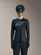 Stella A-Dura Ride Jersey para mujer, camiseta negra de manga larga con logo gris, ideal para ciclismo de montaña.