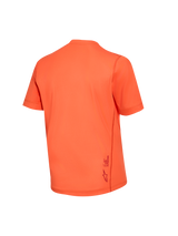 Jersey Stella A-Dura Ride naranja para mujer, vista trasera, tejido jacquard técnico y detalle del logotipo inferior.