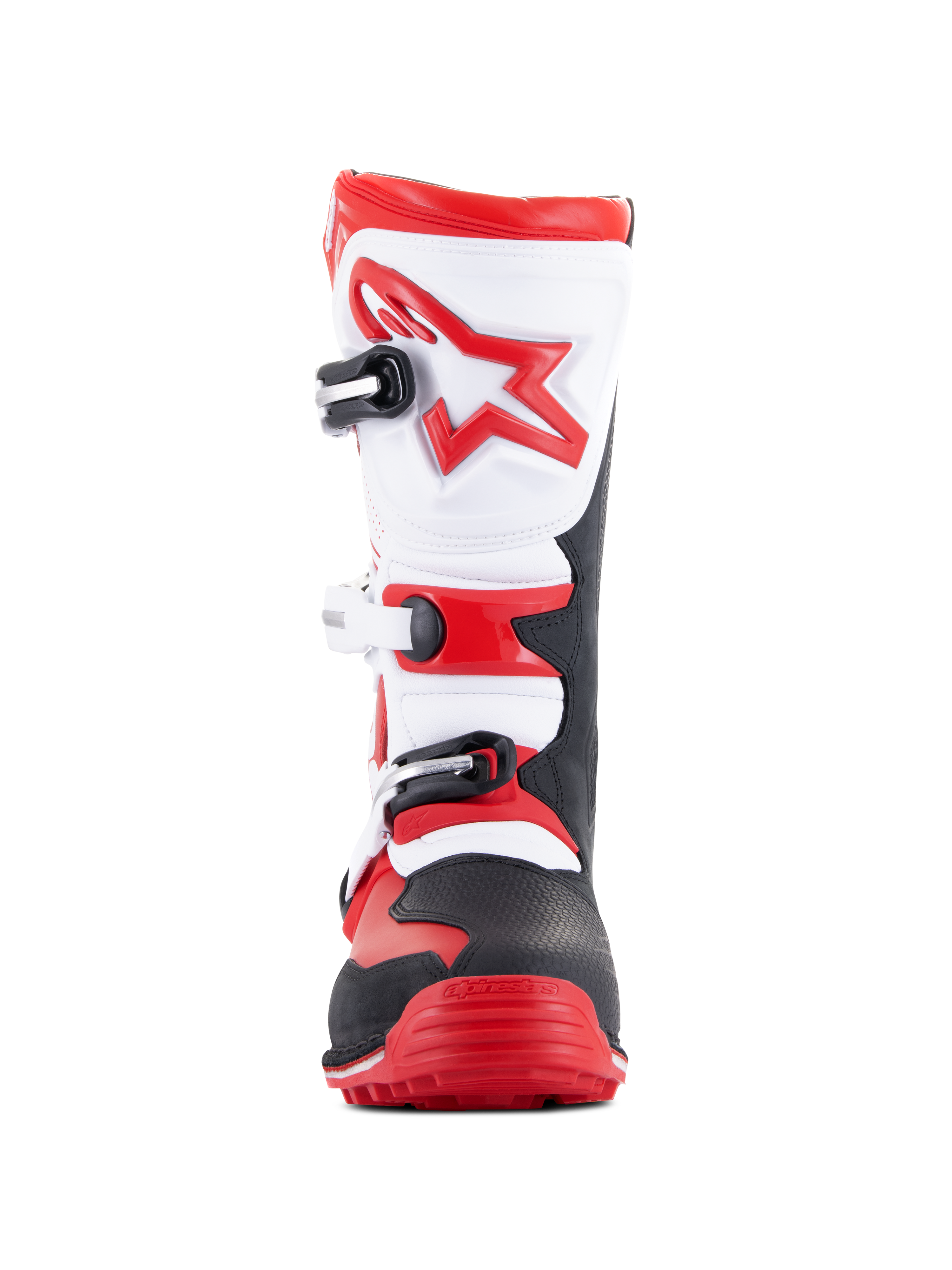 Botas Alpinestars Tech-T, botas de trial para motocicleta, rojo brillante, negro y blanco, vista frontal que presenta una placa de espinilla blanca ergonómica con el logo de una estrella roja, sistema de cierre de tres hebillas y una zona de la puntera robusta en negro y rojo, diseñadas para la práctica de trial todoterreno