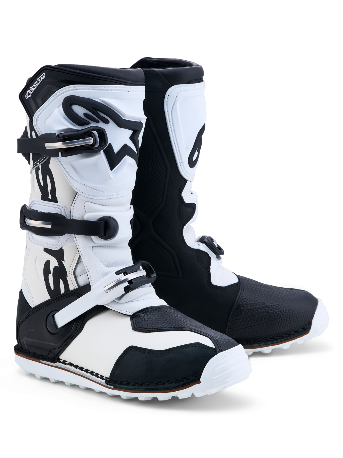 Alpinestars Tech-T, botas de moto para trial, negras y blancas, con triple hebilla y espinilleras de TPU.