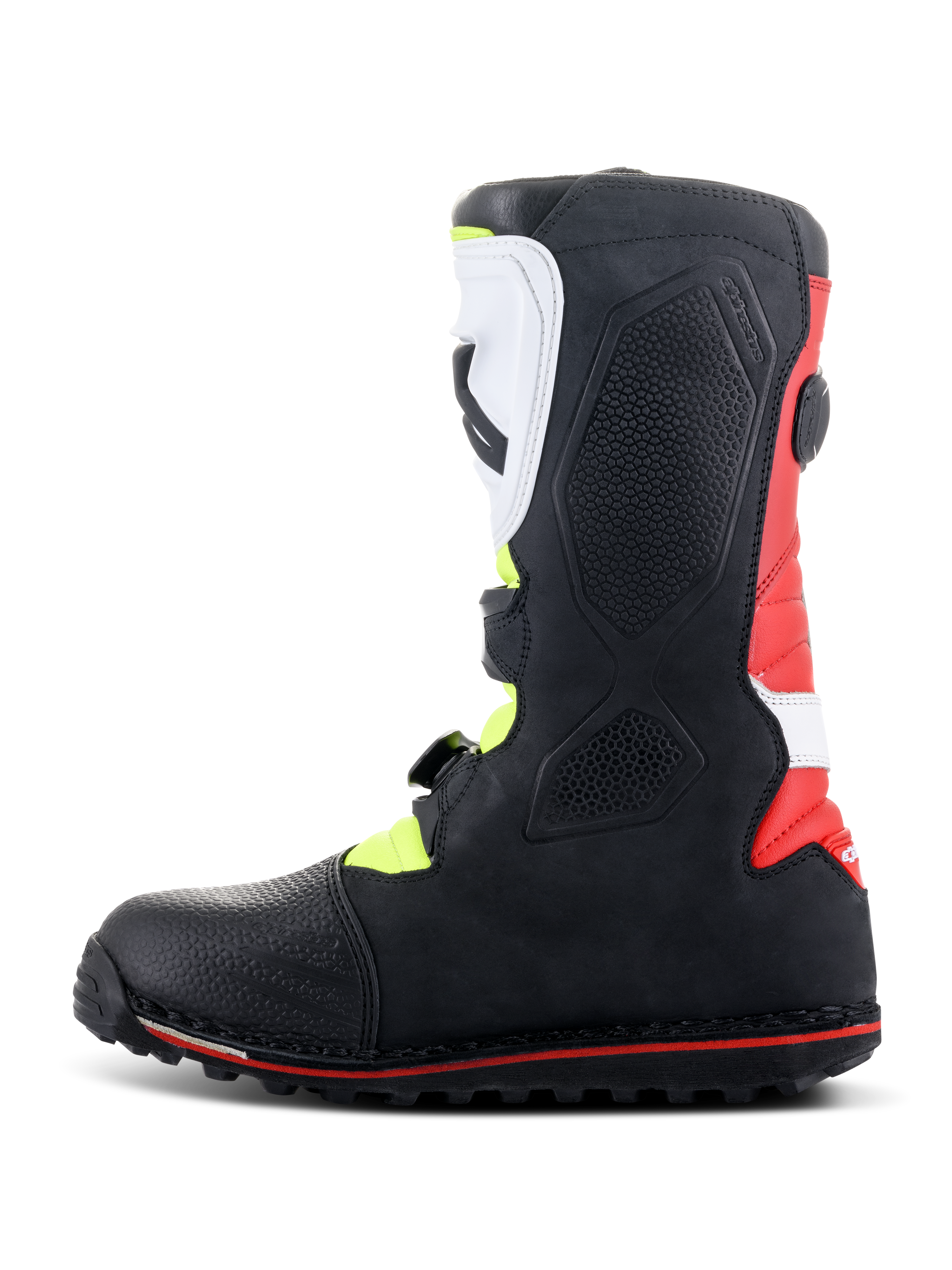 Botas Alpinestars Tech-T, botas de moto trial, blanco, rojo, amarillo flúor y negro, vista de perfil lateral que muestra la espinillera ergonómica blanca y el sistema de hebillas, panel del talón rojo y suela especializada para trial con línea de acento roja.