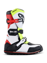Botas Alpinestars Tech-T, botas de moto para trial, blanco, rojo, amarillo fluorescente y negro, con espinillera protectora, hebillas ajustables en rojo y negro, y una suela especializada para trial, vista de perfil lateral