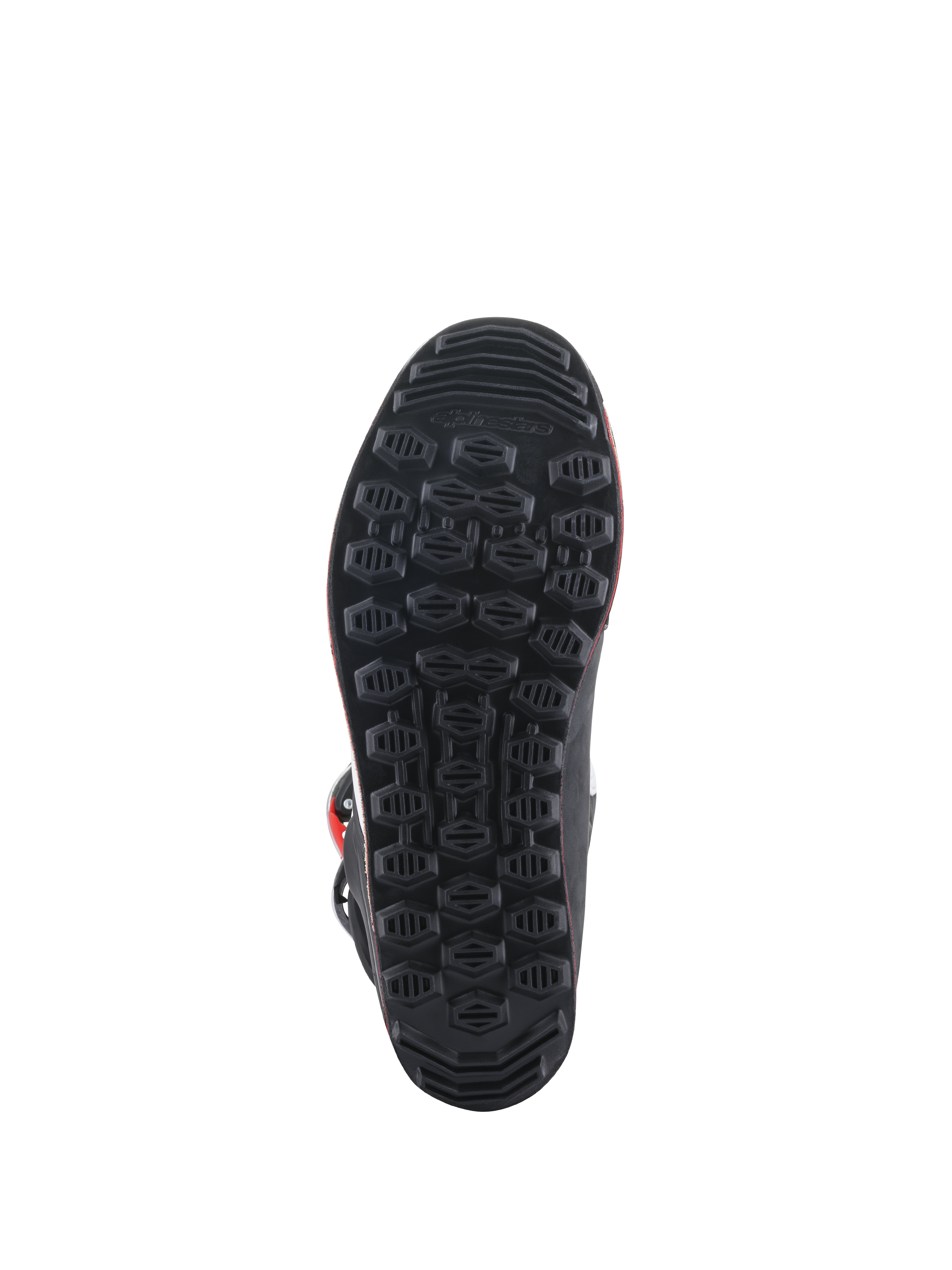 Botas Alpinestars Tech-T, vista de la suela, suela de goma negra con patrón de agarre hexagonal texturizado, diseñada para sensibilidad en el trial y control de los estribos.