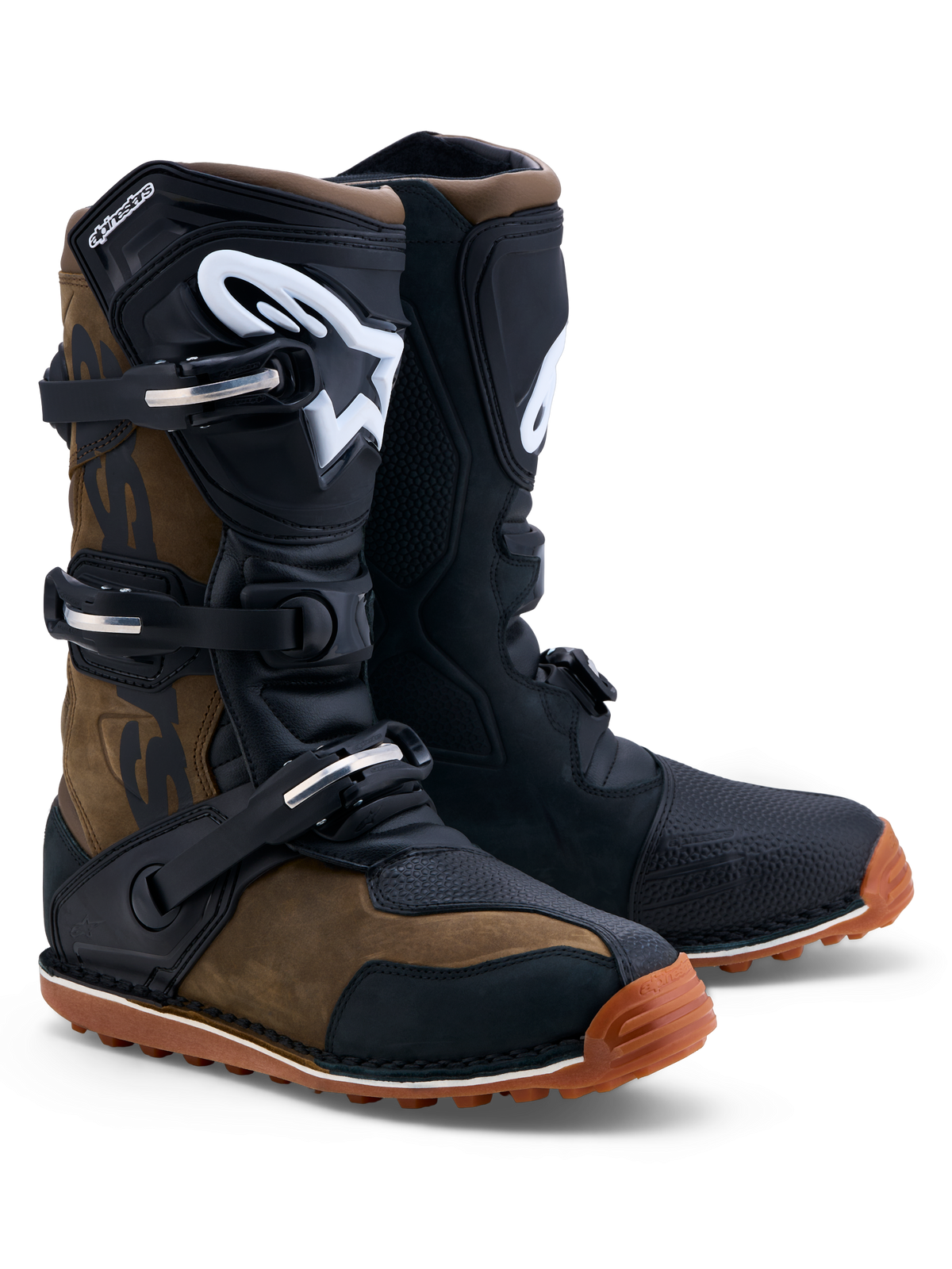 Alpinestars Tech-T, botas de moto para trial, marrones y negras, de cuero con espinilleras de TPU ergonómicas y sistema de cierre de tres hebillas.