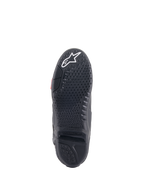 Botas Alpinestars Tech 10, botas de motocross, vista de la suela negra con escultura de agarre patentada y banda de rodadura texturizada, logotipo de estrella blanco en la puntera e inserto central de la suela reemplazable para rendimiento todoterreno