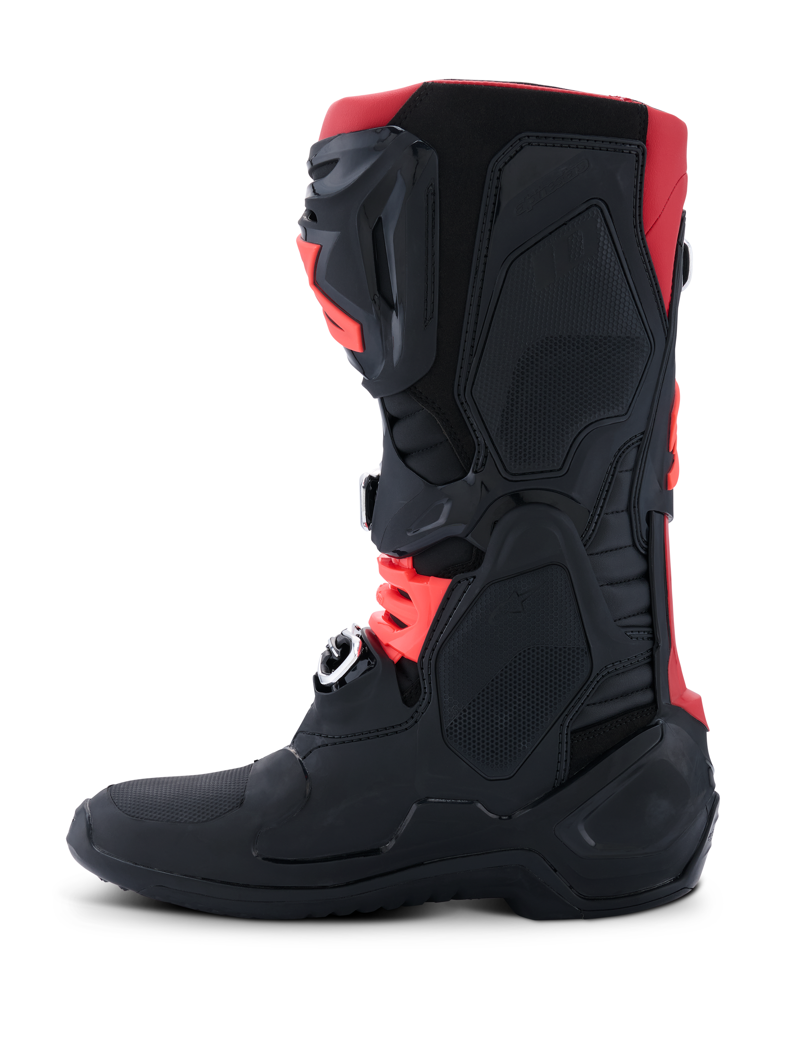 Botas Alpinestars Tech 10, botas de motocross, negro y rojo, vista lateral que muestra el chasis protector de TPU, hebillas de aluminio forjado en frío y diseño aerodinámico todoterreno