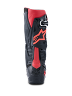 Botas Alpinestars Tech 10, botas de motocross, negras y rojas, vista trasera con logo Astars rojo, Protector Dinámico de Compresión del Talón y chasis de TPU robusto para competición todoterreno de alto rendimiento.