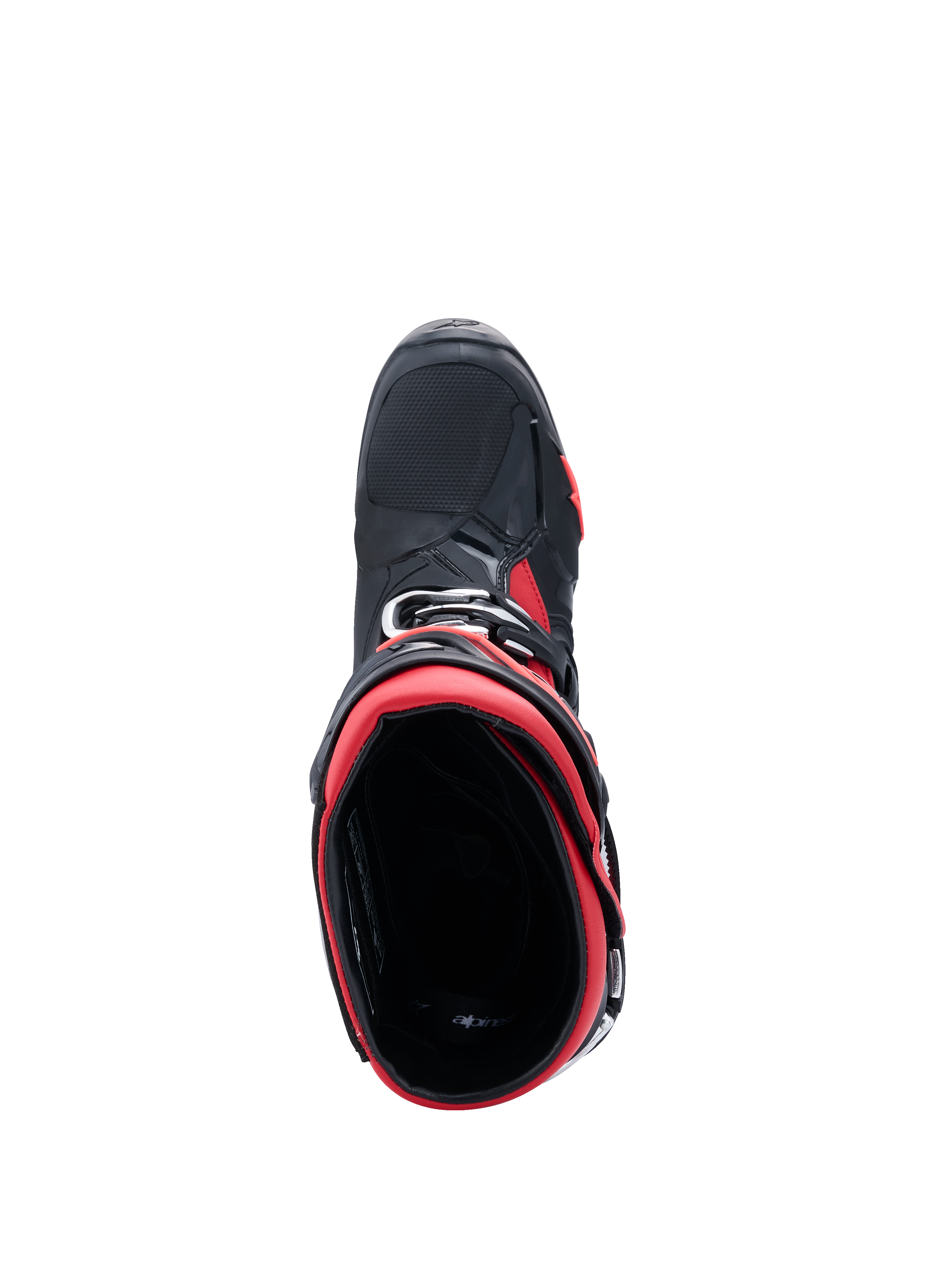 Botas de motocross Alpinestars Tech 10, negro y rojo, vista superior desde arriba hacia la apertura de la bota, destacando el forro interior rojo y el chasis exterior negro con acentos rojos, diseño profesional de equipamiento para todoterreno