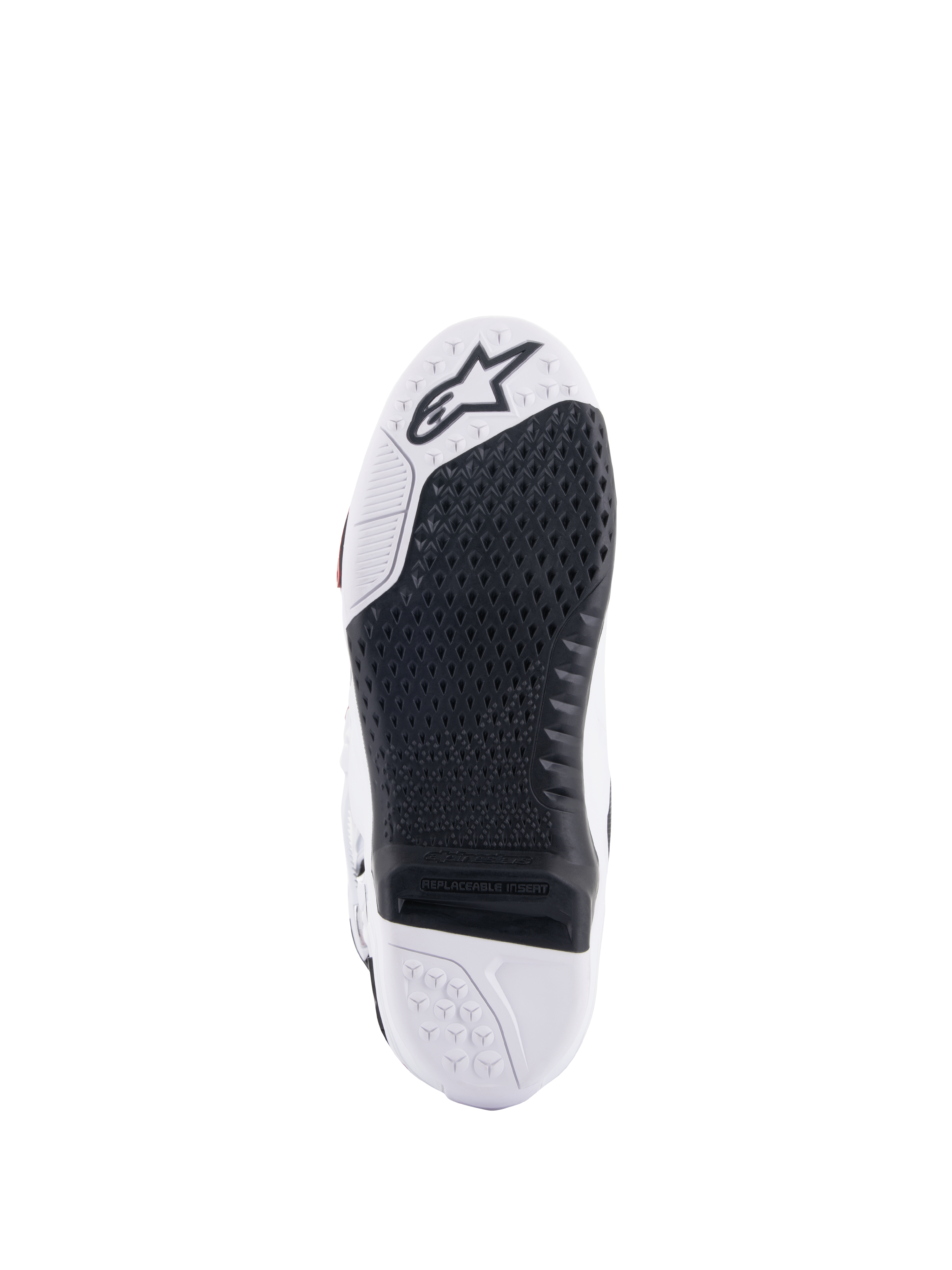 Botas Alpinestars Tech 10, botas de motocross, vista inferior que muestra el inserto central reemplazable negro y la suela blanca, patrón de agarre texturizado, logotipo de la estrella de Alpinestars en la zona de la puntera, calzado duradero para todoterreno