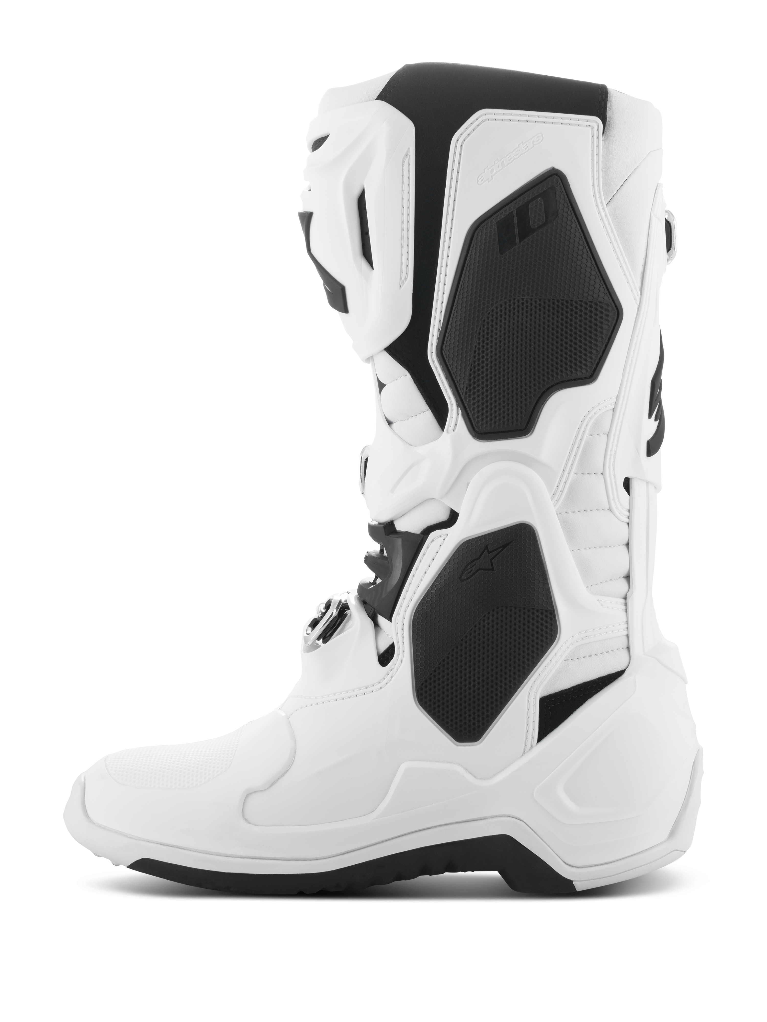 Botas Alpinestars Tech 10, botas de motocross, blancas con detalles en negro, vista de perfil lateral que muestra las carcasas protectoras de TPU, sistema de cierre con hebillas y diseño aerodinámico de alto rendimiento para competición off-road