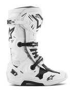 Botas Alpinestars Tech 10, botas de motocross para competición, blancas y negras, sistema de cierre con triple hebilla, carcasa de TPU reforzada con logotipos 'Tech 10' y 'DHCP', suela gruesa y robusta, calzado de protección con certificación CE para carreras todoterreno