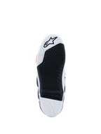 Botas Alpinestars Tech 10, vista de la suela, blanco, violeta, azul marino y rosa flúor, suela de goma negra de alto agarre con inserto central reemplazable, puntera y talón blancos con logo de estrella, calzado profesional de motocross