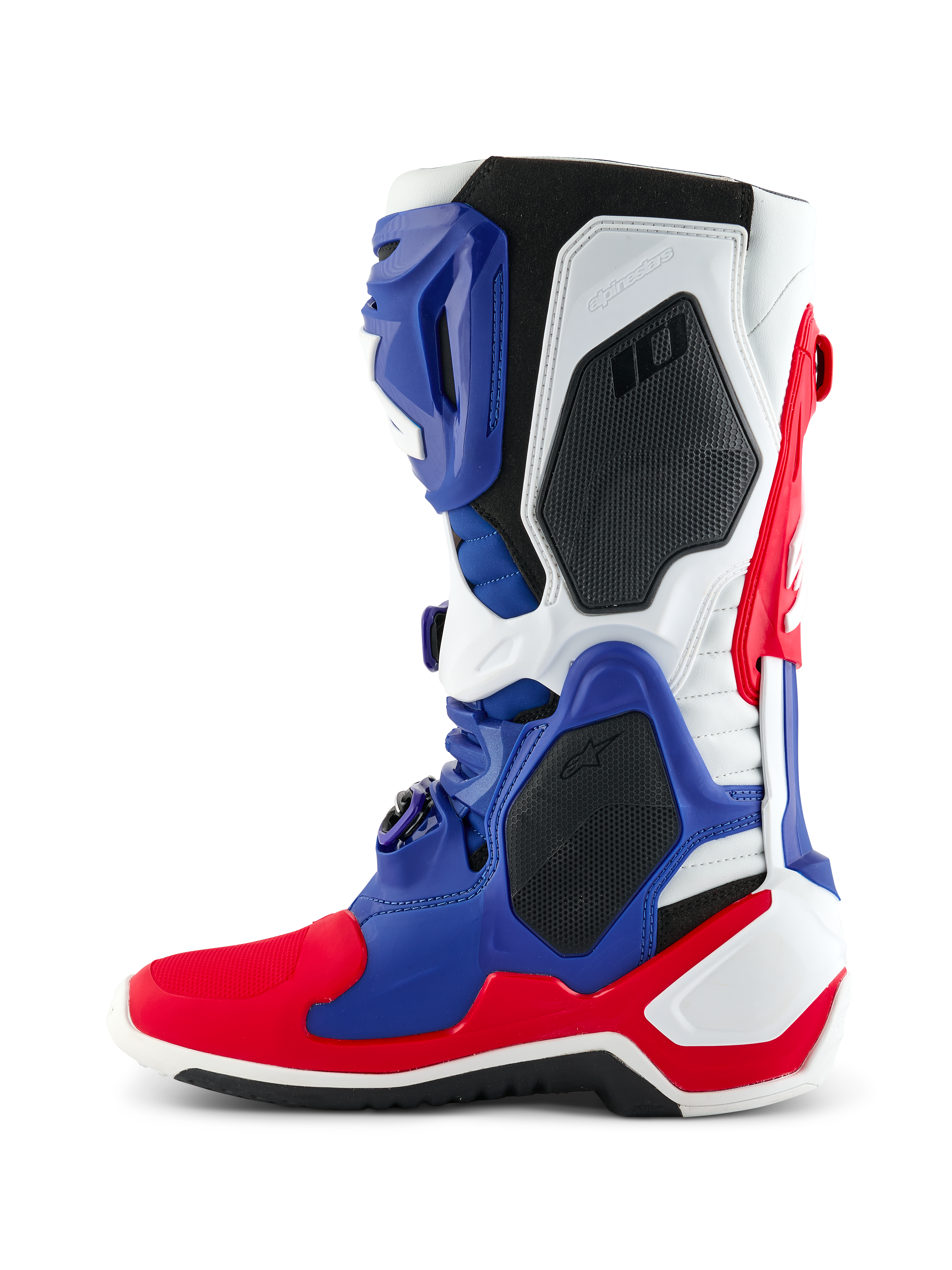 Alpinestars Limited Edition Fortitude Tech 10 Boot, Motocross Boot, Bright Red White and Blue, lateral profile view featuring a multi-paneled TPU chassis, black protective honeycomb inserts, and Alpinestars branding, professional-grade off-road racing footwear