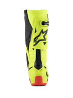 Botas Alpinestars Tech 10, botas de motocross, amarillo flúor, negro y rojo flúor, vista trasera que muestra el chasis amarillo fluorescente con detalles negros y protector de talón rojo, calzado profesional para carreras todoterreno
