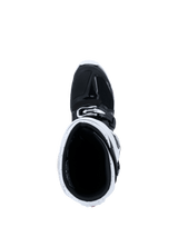 Botas Alpinestars 2026 Tech 7 Enduro, botas de motocross, negro y blanco, vista desde arriba hacia el interior de la caña de la bota mostrando la polaina blanca y el interior negro, equipamiento especializado para off-road y enduro